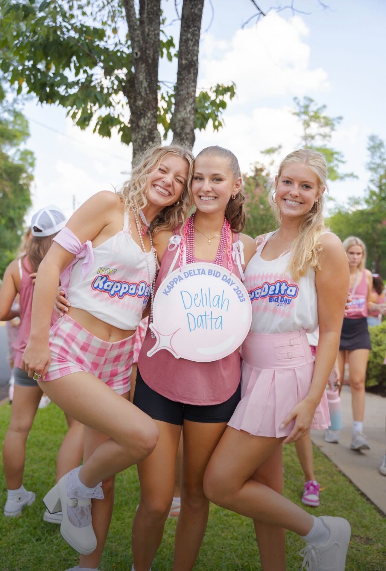 Women celebrating on bid day